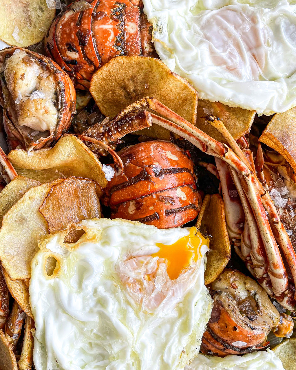 Frit de langosta con patata y huevo